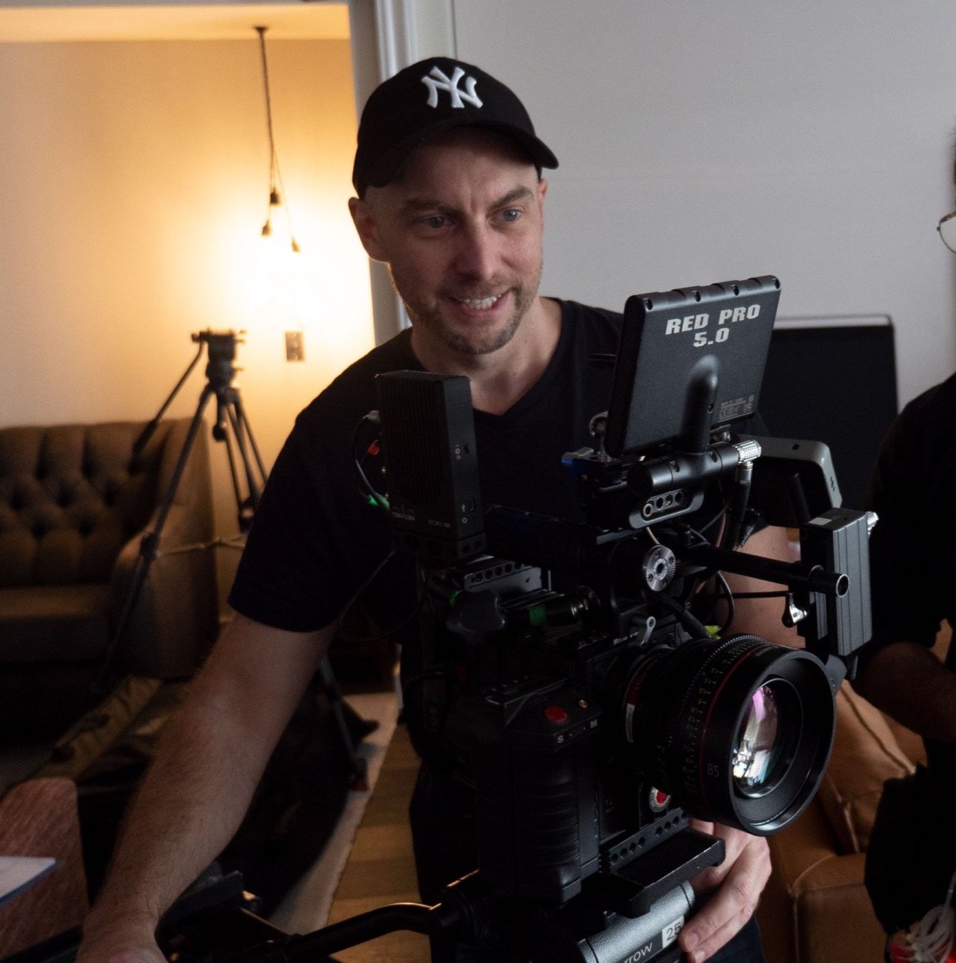 Adam St John — director and cinematographer on set in Bangkok
